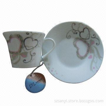 Coffee cup and saucer with stand